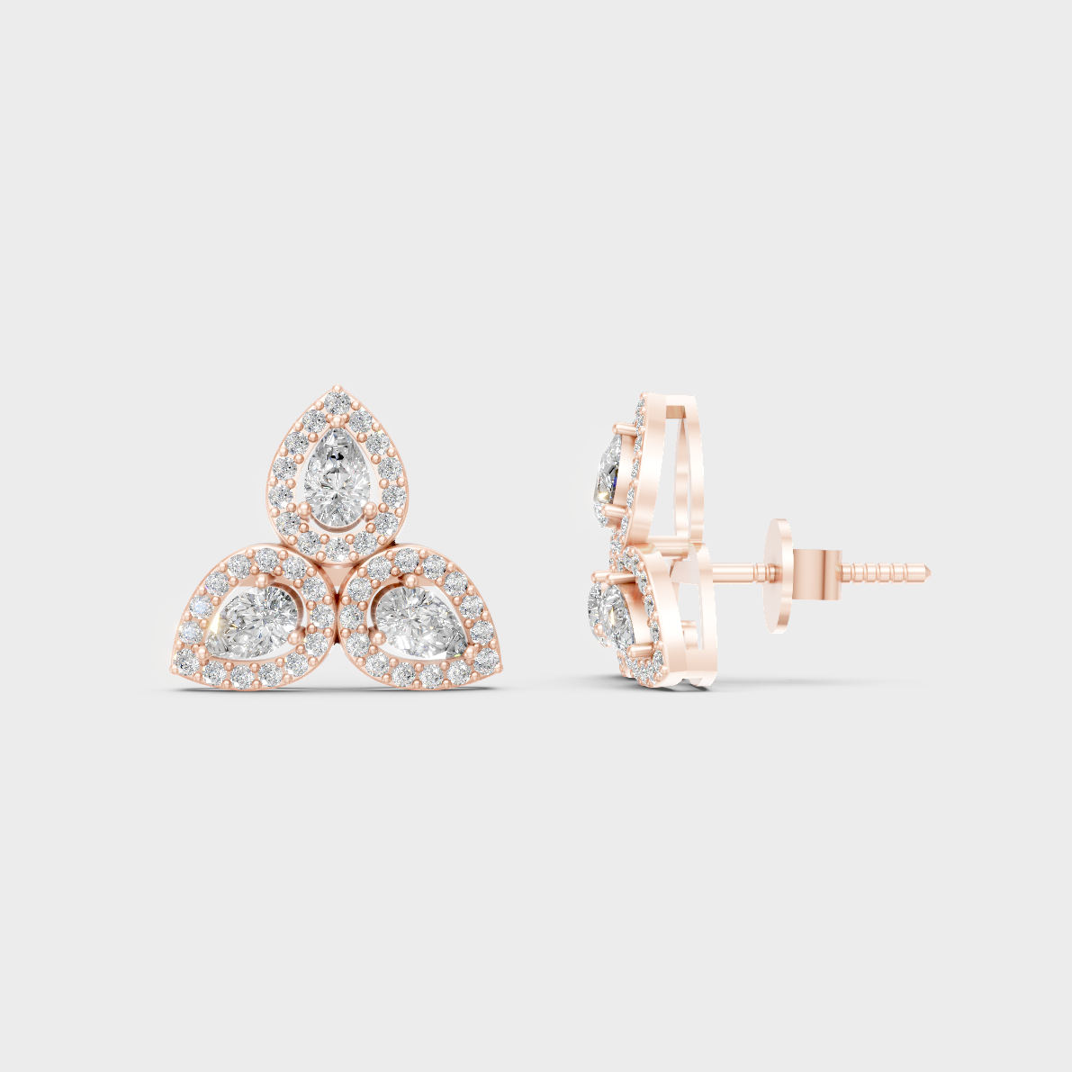 Romantic profile of 0.96 Carat Round and Pear Cut Lab-Grown Diamond Stud Earrings in blush 14K Rose Gold.